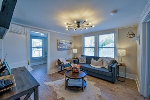 Living Room - The living room has a plenty of seating for your group to hang out and watch tv.