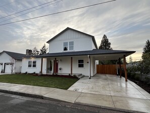 Front of house and driveway for parking. 