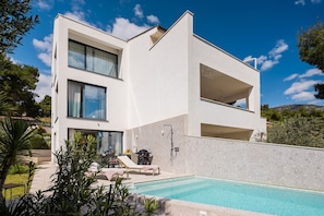 Luxury Beachfront Villa Manera Bol for 12 persons with heated pool on promenade Zlatni Rat by the pebble beach