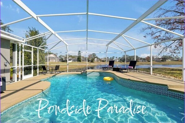 Unwind by your private saltwater pool with serene pond views. Perfect for relaxation!