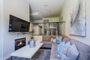Living Room with upper dining room view