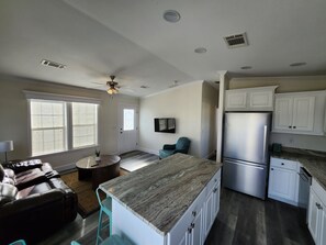 Bright and airy space with modern decor, perfect for relaxation and gatherings!