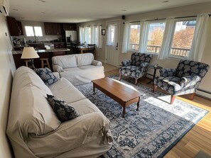 Morning sunlight in an open concept family room and kitchen