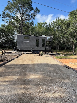 Double driveway with 6 parking places plenty of parking for boat or wave runner.