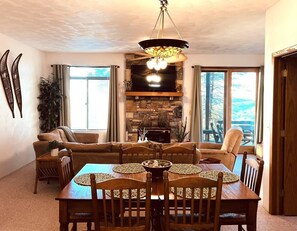 Open concept living and dining area, with plenty of seating for 10.