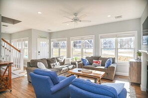 Curl up in the coastal living room & stream all your favorite entertainment