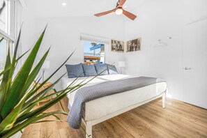 King size bed in the primary bedroom. 