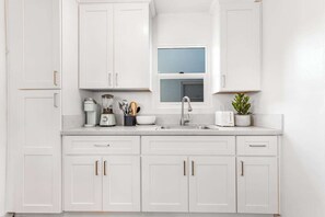 Cook up a storm in this fully equipped kitchen! Bright, remodeled kitchen stocked with kitchen essentials!
