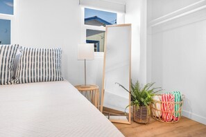 A Cozy Retreat: Relax and Unwind in Our Charming Bedroom! Bedroom offers a king bed with hotel quality linens!