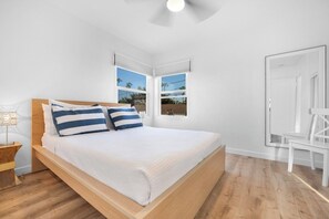 A Cozy Retreat: Relax and Unwind in Our Charming Bedroom! Queen size bed in the primary bedroom. 