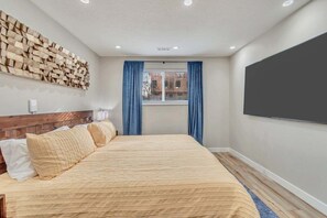Wake up refreshed in a king-sized bed with blackout curtains and a Smart TV for entertainment.