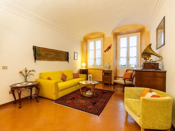 Interior Design, Wall, Furniture, Yellow, Flooring, Couch, Room, Floor, Ceiling, Living Room