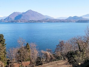 Sky, Blue, Water, Water Resources, Mountainous Landforms, Body Of Water, Mountain, Natural Landscape, Hill, Highland