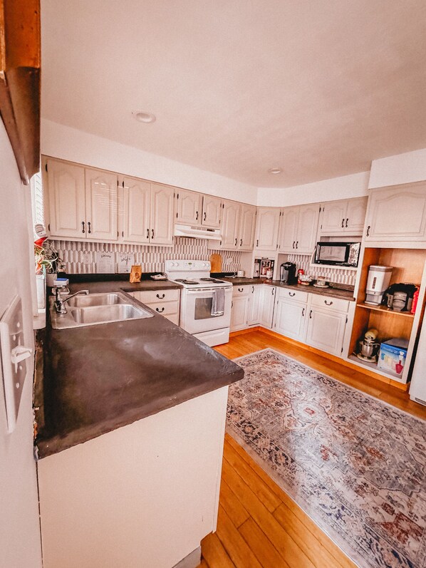 Fully stocked kitchen with coffee maker, Keurig, air fryer, blender, and more!