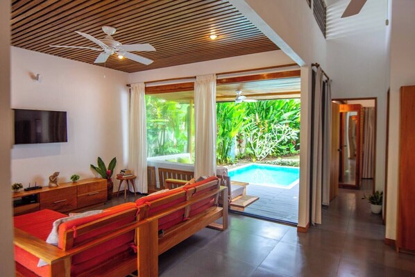 Room with direct access to the pool