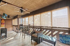 Have your morning coffee on the screened in porch.