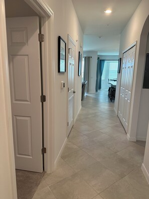 Looking in from front door, master on left, second bedroom and bath on right. 
