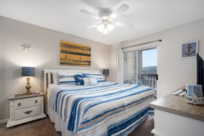 Drift off into sweet dreams in the luxurious king size bed.  The master bedroom also has a sliding door to the condo's private deck - the perfect spot to savor a morning cup of coffee.