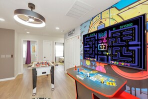 Arcade Room – Challenge your friends with classic arcade games.