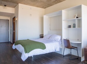 Murphy bed that folds up into a dining table/workspace