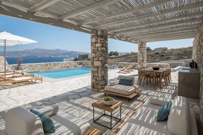 outdoor sitting area by the pool