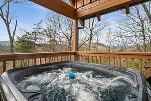 Relax in the new hot tub after a day of exploring.