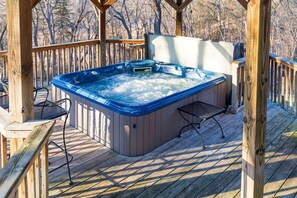 Covered hot tub available year-round, and cleaned prior to each guest.