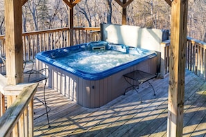 Covered hot tub available year-round, and cleaned prior to each guest.