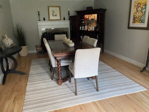 Formal 6 person dining room with bar. 