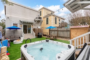 Ultimate Relaxation – Whether it's morning or evening, the shared hot tub is always ready for a refreshing dip.