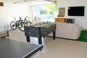 Securely store your bikes with a 9-slot rack while playing ping-pong, foosball.