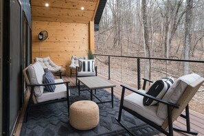Relax on ample seating while taking in the breathtaking pond views.