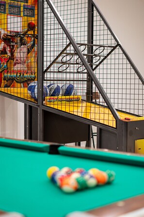 Test your skills and shoot for the high score with our basketball arcade machine in our community game room —fast-paced fun for all ages!