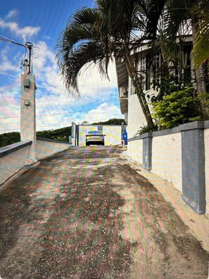 Driveway that fits 3 cars.