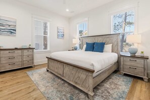 Bedroom 1: King bed, smart TV, walk-in closet, main floor
