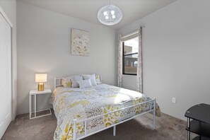 Guest bedroom 2 with a Queen size bed. Located on second floor.