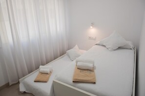 Bedroom with two single beds