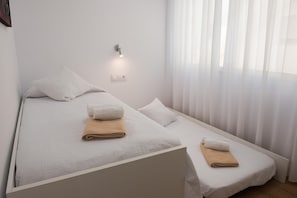 Bedroom with two single beds