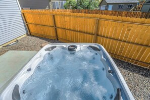 Unwind in the inviting hot tub, the perfect spot to relax after a day of exploring!






