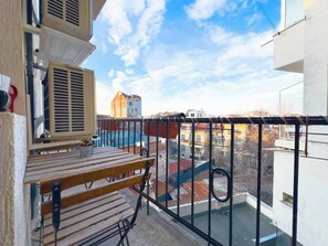 Start Your Day Right! Step onto our balcony and soak in the city views. Book your stay and wake up to this!