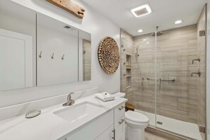 Shared bathroom with walk-in shower 