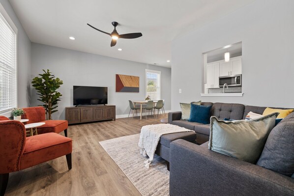 Inviting Living room with 55" smart TV for you to use your streaming services.
