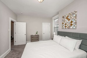 The final bedroom retreat features a plush queen-sized bed