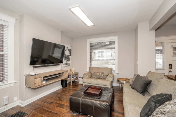 Curl up in the inviting living room & stream your favorites on the smart TV