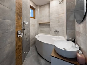 Fresh & Modern Amenities! A clean and stylish bathroom to refresh and recharge. Book now for a comfortable stay!