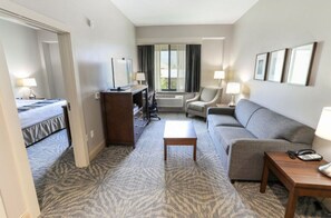 Comfortable suite with a separate living area, perfect for relaxing after a long day.