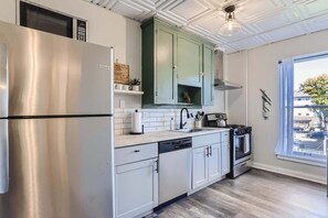 Different colored cabinets contribute to the unique nature of this unit