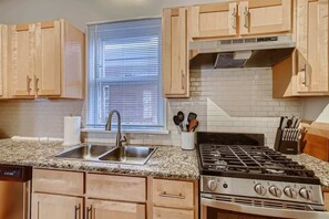Upgraded stainless steal appliances all throughout the kitchen