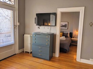 The bedroom opens up to living space for an open feel