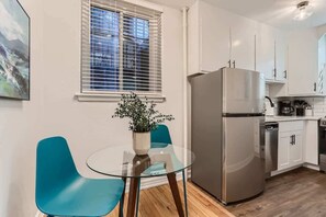 Light kitchen opens to the dining table